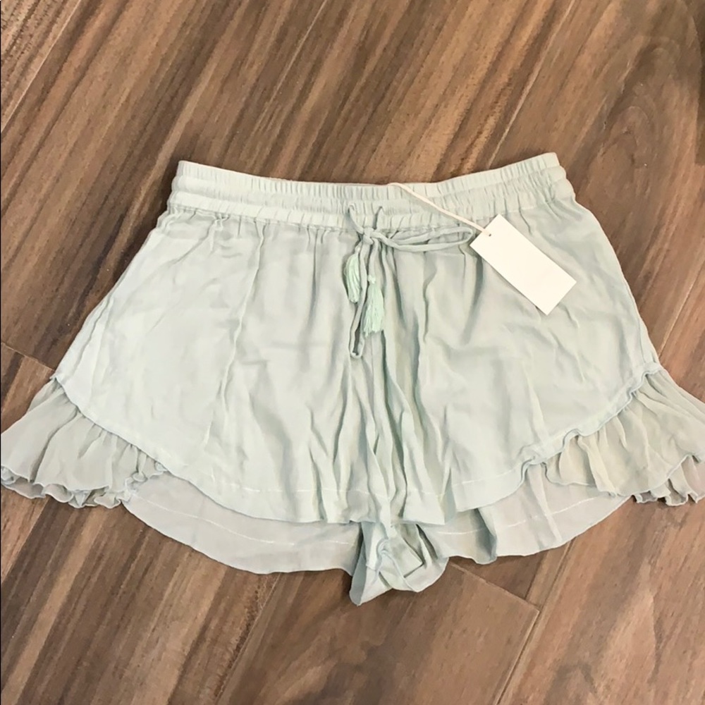 Seafoam green ruffle shorts